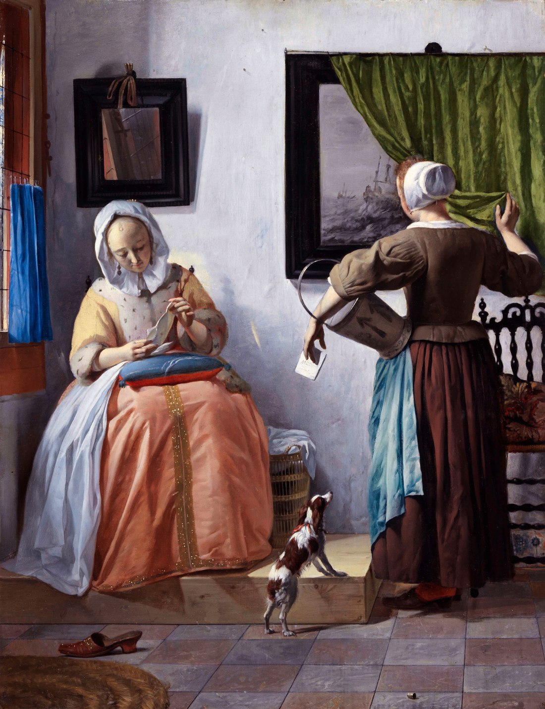 A woman in a rose skirt sits by a window reading a letter, her sewing set down on a cushion in her lap. A maid with her back turned holds a bucket and the letter's cover while lifting a green curtain away from a painting of a ship in rough sea. A small dog looks up; a shoe lies kicked off on the tiled floor.